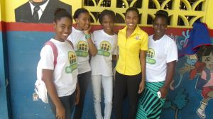 Youth Empowerment Officer Poses with members of Voice For Jamaica